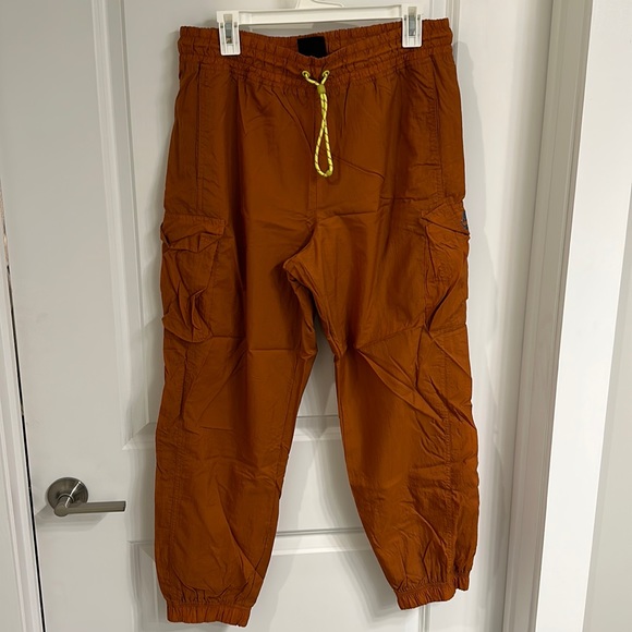 Nike Pants - Nike burnt orange parachute pant joggers. Size L.